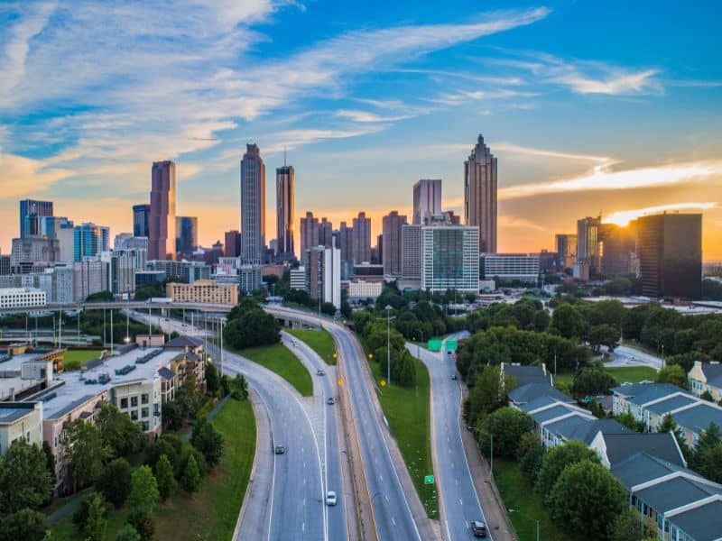 Atlanta, Georgia skyline at sunset representing professional land surveying services, property surveys, and development planning in Atlanta