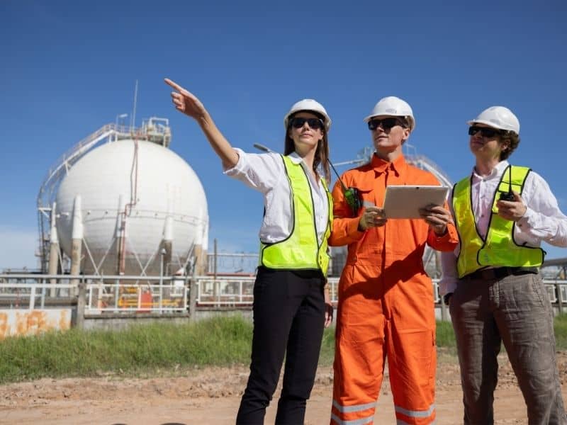 Property professionals reviewing industrial site conditions before ALTA Survey and commercial property transfer decisions.
